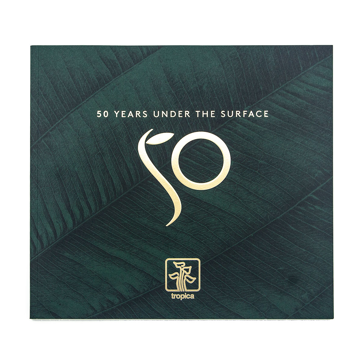 Portfolio med jubilæumsbog for Tropica af freelance marketingkonsulent og freelance marketing konsulent i Randers Marketingsnedkeren